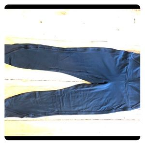 Athleta Gray legging.  Keyholes down the side.